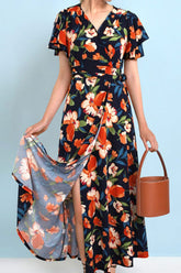 Robe grande taille à col surplis et manches flottantes